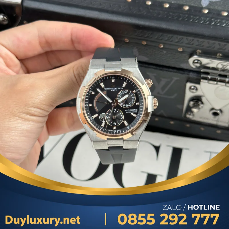 Đồng Hồ Vacheron Constantin Rep 11 Overseas Dual Time 47450 Demi Vàng Hồng Xưởng 9F 42mm
